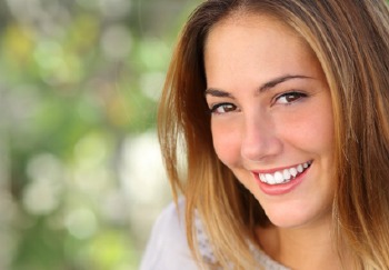 woman smiling outside