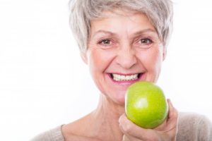 woman apple smiling